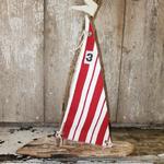 Driftwood sailboat made from driftwood found on the beaches of Long Island. Sails made of vintage fabric. Measures 13" w x 16" h