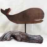 Whale cut-outs are made of 1" thick antique barn wood.  The driftwood has been collected from our local Eastern Long Island Beaches and from the Virginia Chesapeake Bay area. The entire piece measures 15" w x 11" h