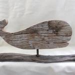 Whale cut-outs are made of 1" thick antique barn wood. The driftwood has been collected from our local Eastern Long Island Beaches and from the Virginia Chesapeake Bay area. The entire piece measures 18" w x 8" h