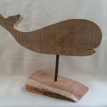 Whale cut-outs are made of 1" thick antique barn wood. The driftwood has been collected from our local Eastern Long Island Beaches and from the Virginia Chesapeake Bay area. The entire piece measures 14.5" w x 11" h.  This whale is on a red cedar slab cut from a piece of driftwood